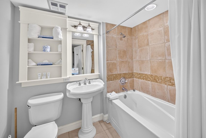 Perched on the 5th floor, this bay-facing studio offers stunning - photo 10