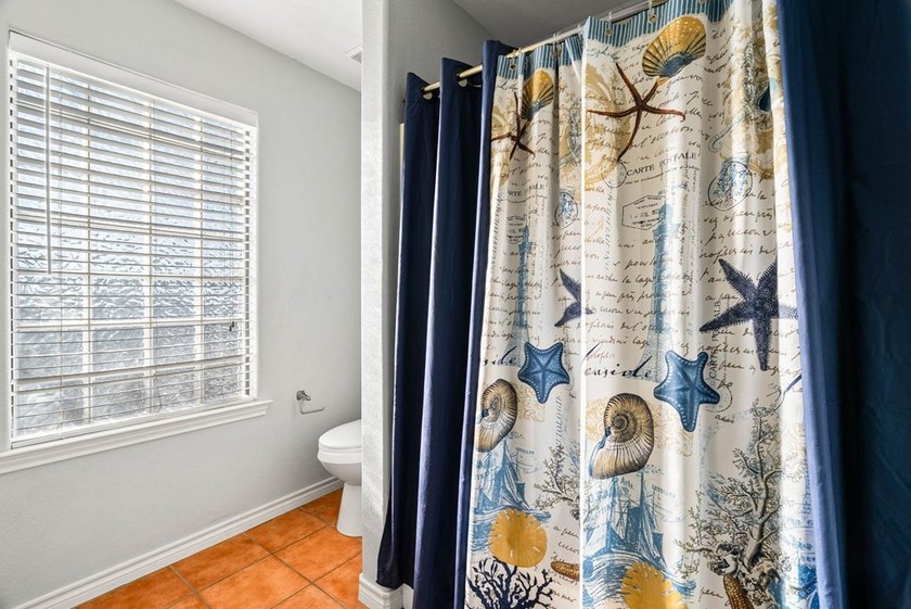 A home that truly meets every need and desire. Situated on - photo 18