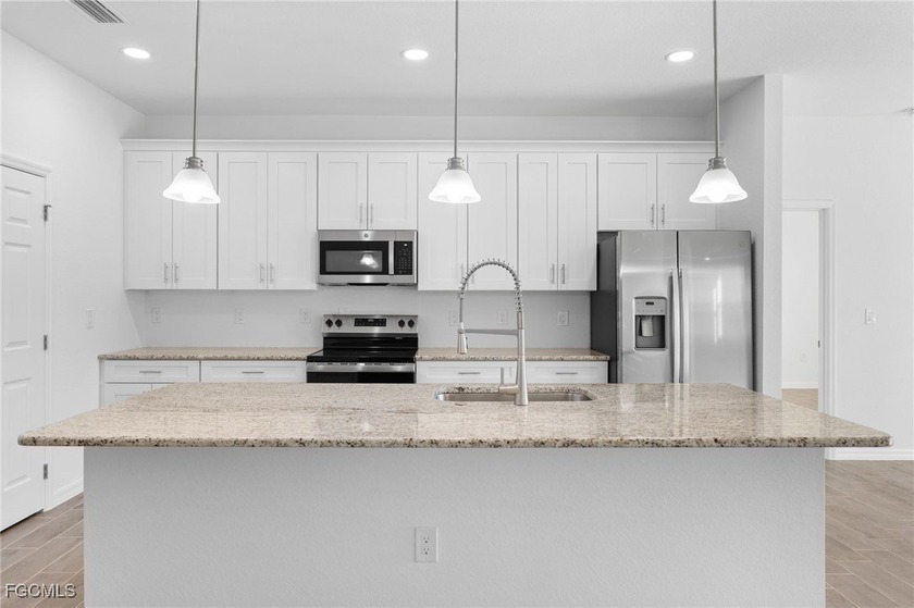 Brand new construction located on a freshwater canal in a highly - photo 9
