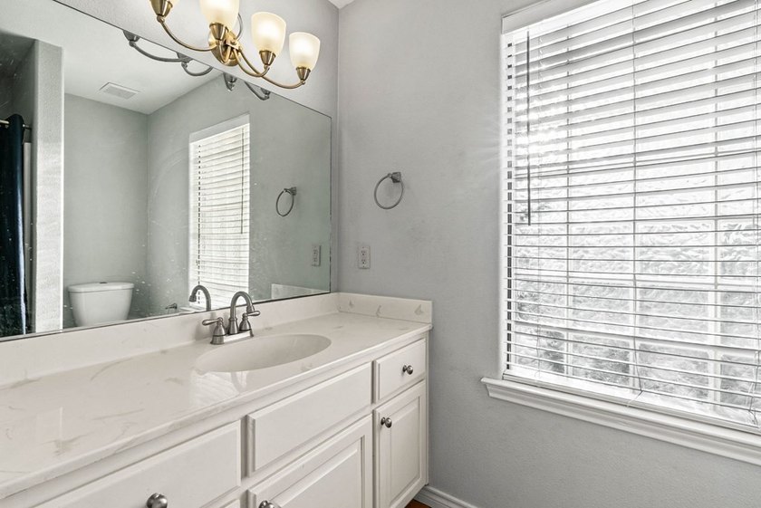 A home that truly meets every need and desire. Situated on - photo 19