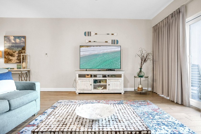 Enjoy effortless beach living from this beautifully updated - photo 9