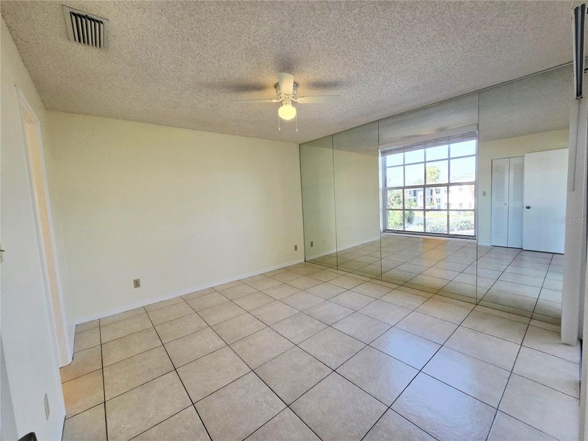 Welcome to this inviting 2-bedroom, 1.5-bath corner unit located - photo 22