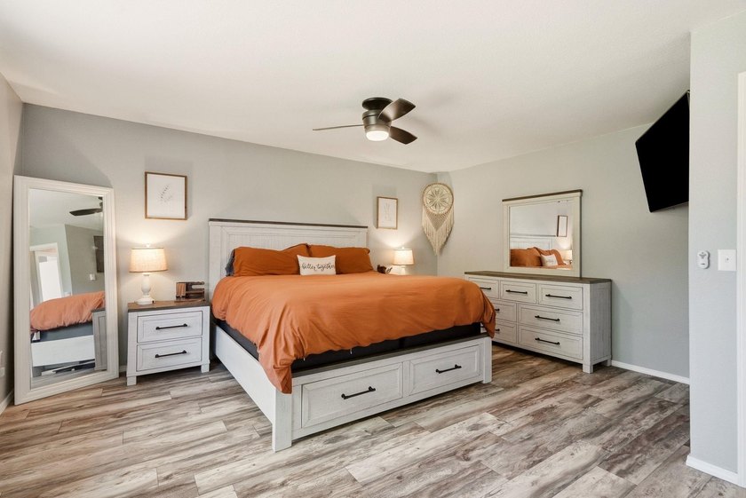 Situated on a sprawling 23-acre property along the serene shores - photo 12