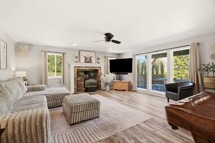 Situated on a sprawling 23-acre property along the serene shores - photo 16