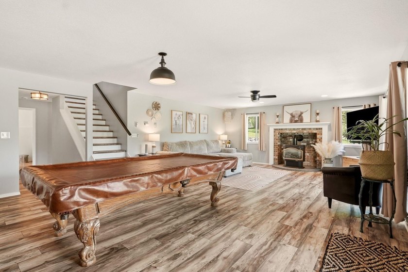 Situated on a sprawling 23-acre property along the serene shores - photo 17