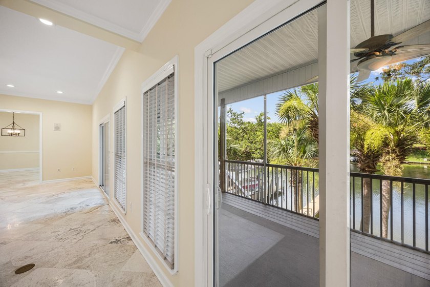 Waterfront Living on the Bayou! This stunning, three-story home - photo 9