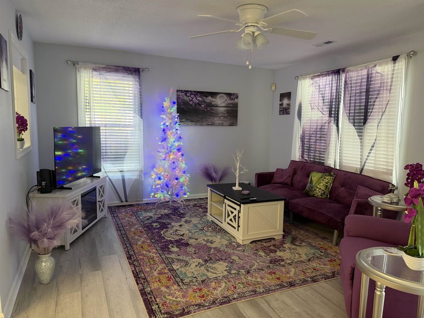 This townhouse comes fully furnished, only one block from the - photo 4