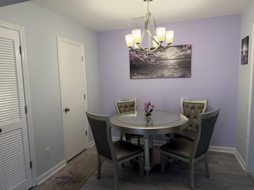 This townhouse comes fully furnished, only one block from the - photo 6