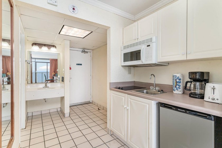 Welcome to Sand Dunes! This efficiency, direct oceanfront condo - photo 8