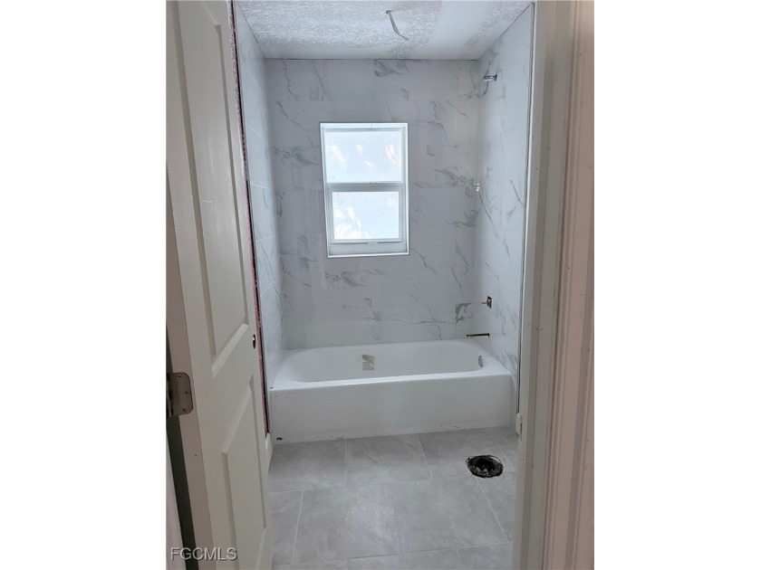 Investor opportunity with significant renovation work already - photo 8