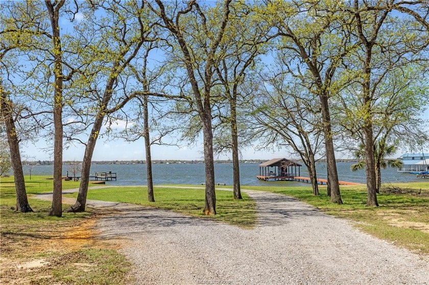 Want room to spread out near the water? These three wooded lots - photo 7