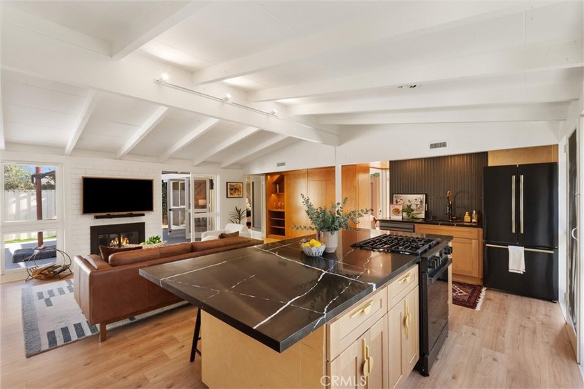 Welcome to this beautifully updated 4-bedroom, 2-bath Cliff May - photo 11