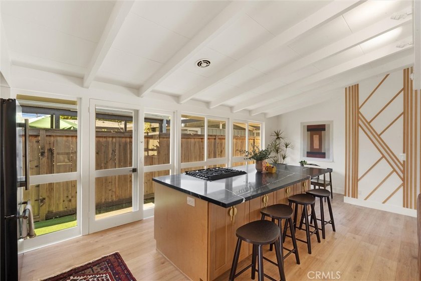 Welcome to this beautifully updated 4-bedroom, 2-bath Cliff May - photo 12