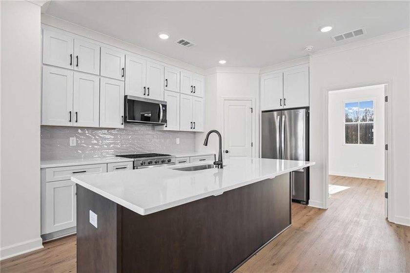 Welcome to The Village! A brand new luxury Townhome Neighborhood - photo 14