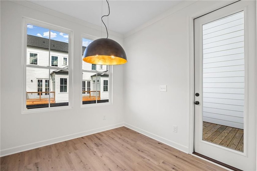 Welcome to The Village! A brand new luxury Townhome Neighborhood - photo 18