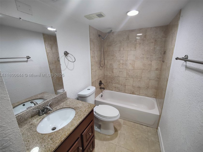 *Located in a desirable neighborhood, this charming 2-bedroom - photo 25