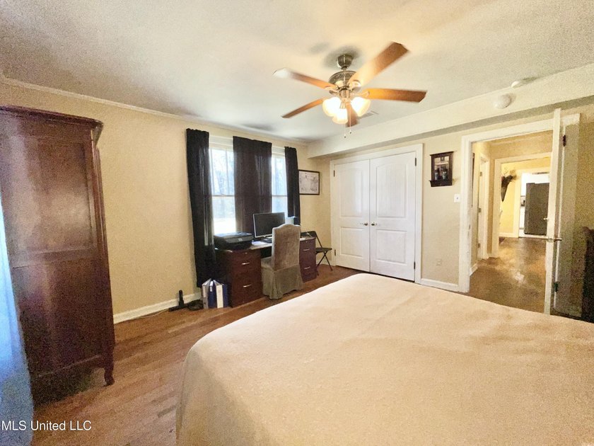 This charming home is a spacious five-bedroom, two full bath - photo 15