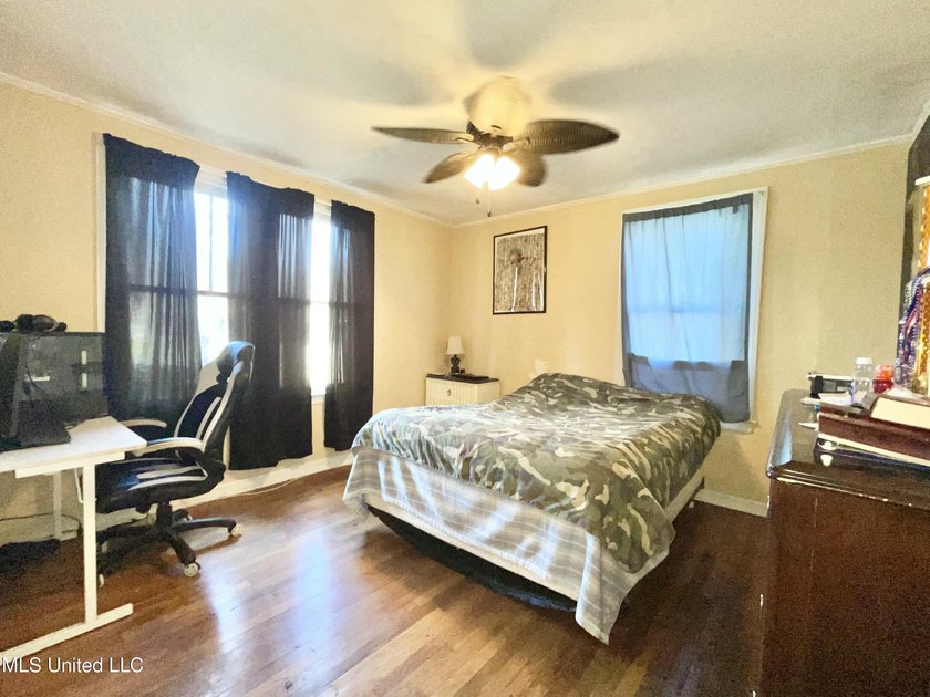 This charming home is a spacious five-bedroom, two full bath - photo 17