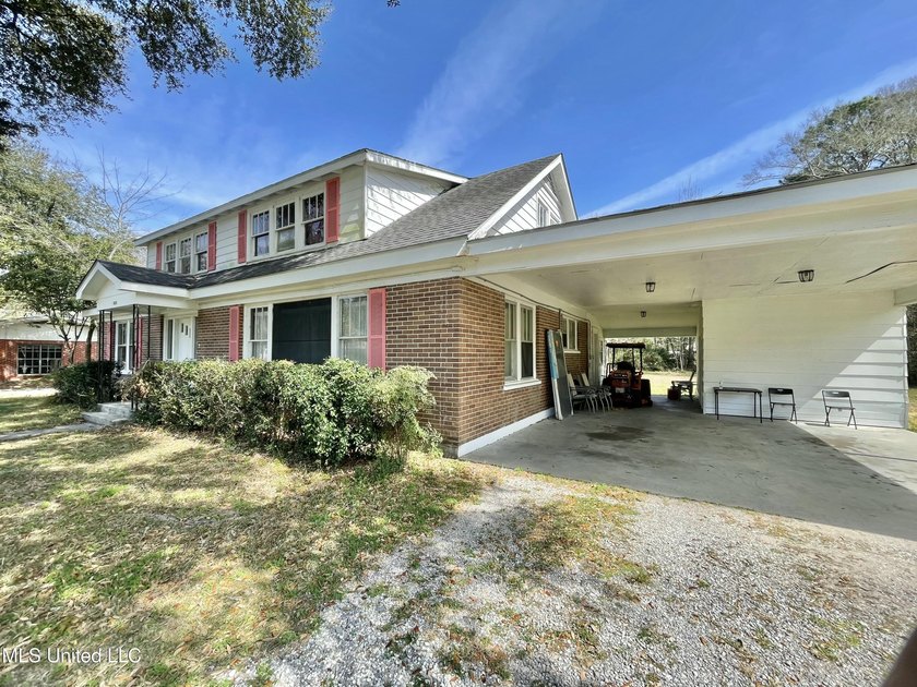 This charming home is a spacious five-bedroom, two full bath - photo 32