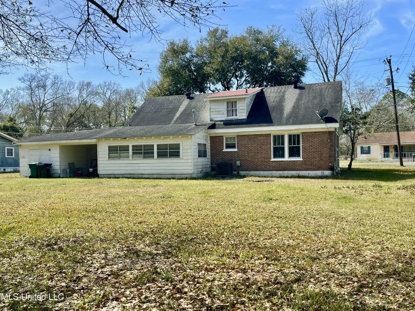 This charming home is a spacious five-bedroom, two full bath - photo 33