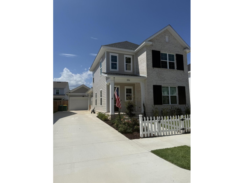 Construction complete and move-in ready! This home is less than - photo 2
