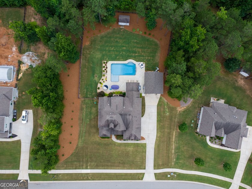 Welcome to 122 Brooks Landing, an exceptional 5-bedroom, 5 - photo 6