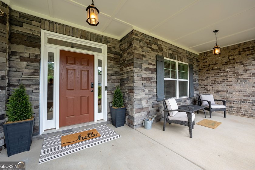 Welcome to 122 Brooks Landing, an exceptional 5-bedroom, 5 - photo 7