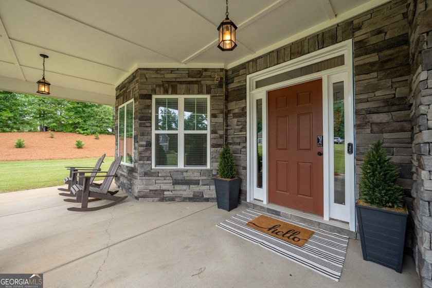 Welcome to 122 Brooks Landing, an exceptional 5-bedroom, 5 - photo 8