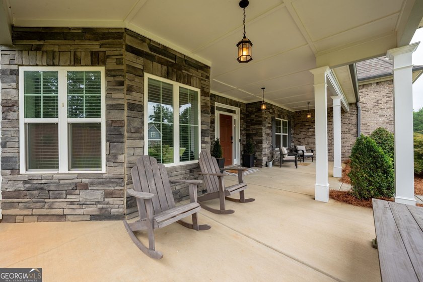 Welcome to 122 Brooks Landing, an exceptional 5-bedroom, 5 - photo 9