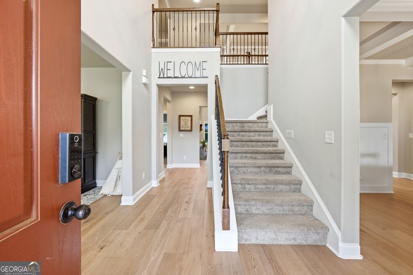 Welcome to 122 Brooks Landing, an exceptional 5-bedroom, 5 - photo 10