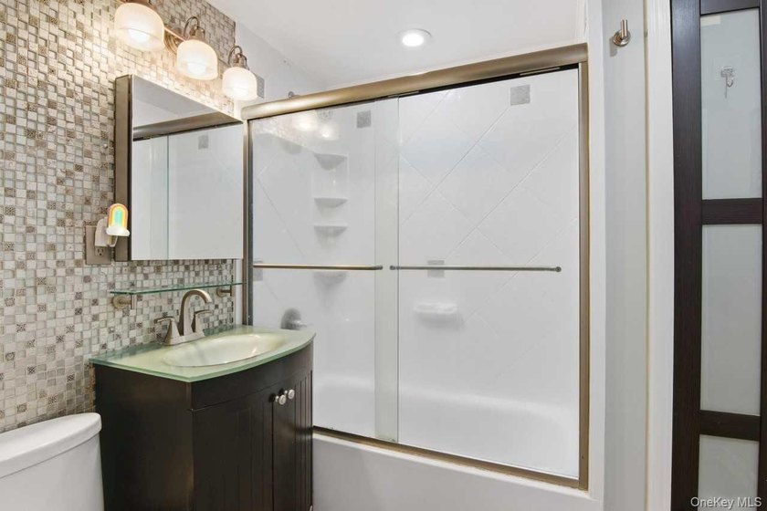 Welcome to this spacious, move-in-ready two-bedroom co-op - photo 13