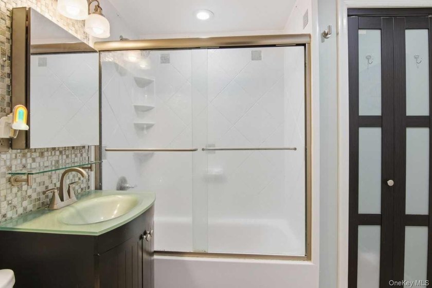 Welcome to this spacious, move-in-ready two-bedroom co-op - photo 14