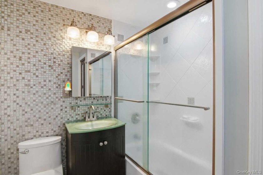 Welcome to this spacious, move-in-ready two-bedroom co-op - photo 15