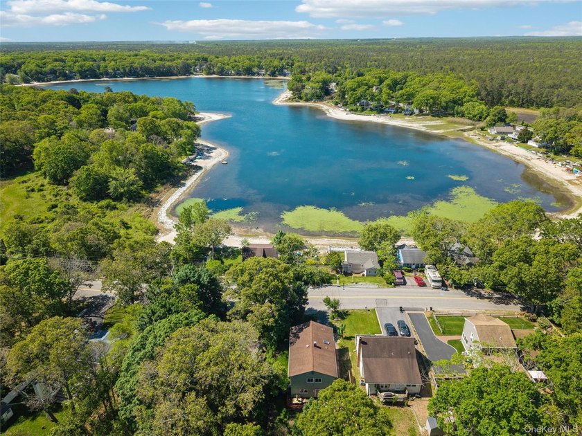 Nestled in the sought-after Lake Panamoka community, this - photo 3