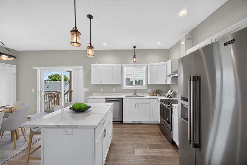 Built in 2021, this quality stick built home offers the ease of - photo 5