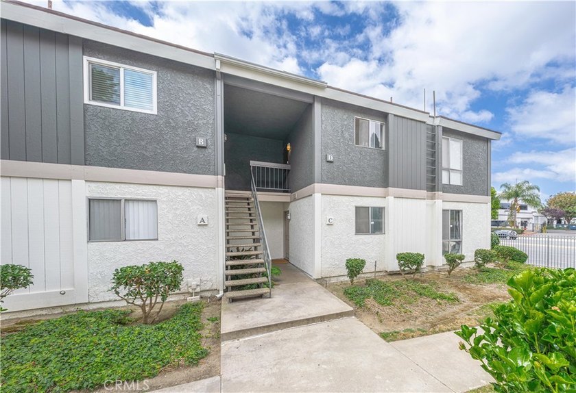 Welcome to this beautifully renovated first-level condominium in - photo 2