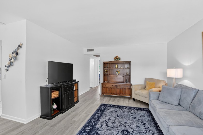 Beautifully RENOVATED 2nd floor CORNER condo in Century Village - photo 7