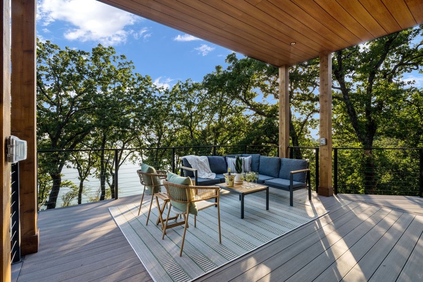 Experience a new level of lakeside living in the exclusive - photo 12