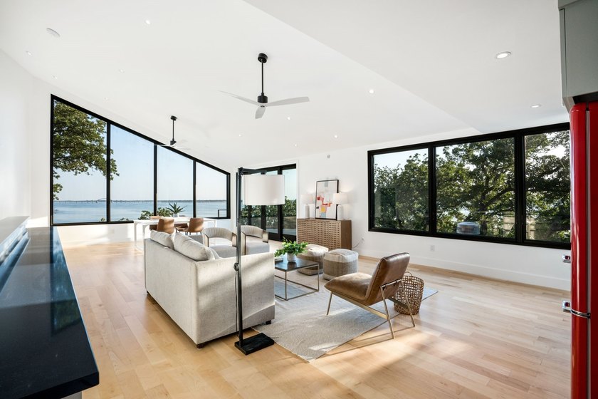 Experience a new level of lakeside living in the exclusive - photo 17