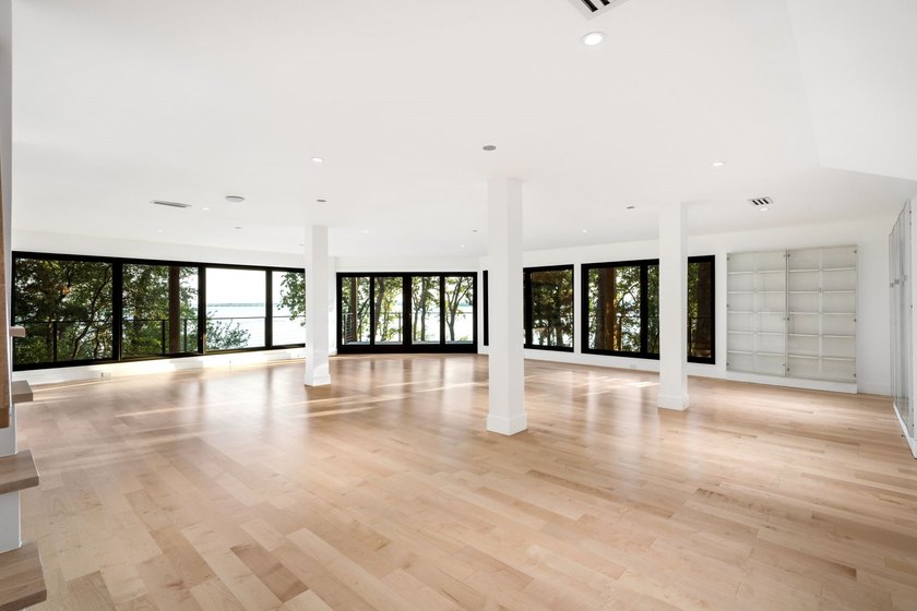 Experience a new level of lakeside living in the exclusive - photo 25