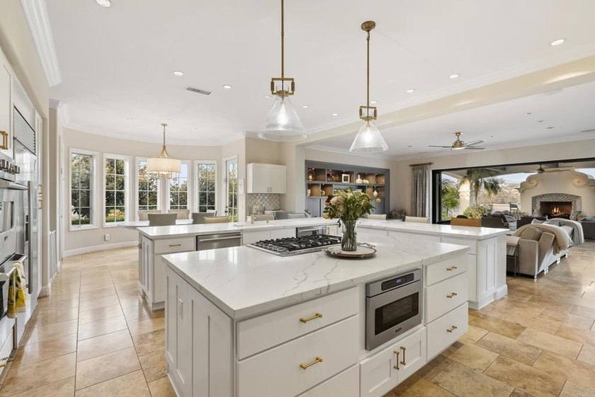 Welcome to 6152 Avenida del Duque, an extraordinary 7-bedroom, 7 - photo 3