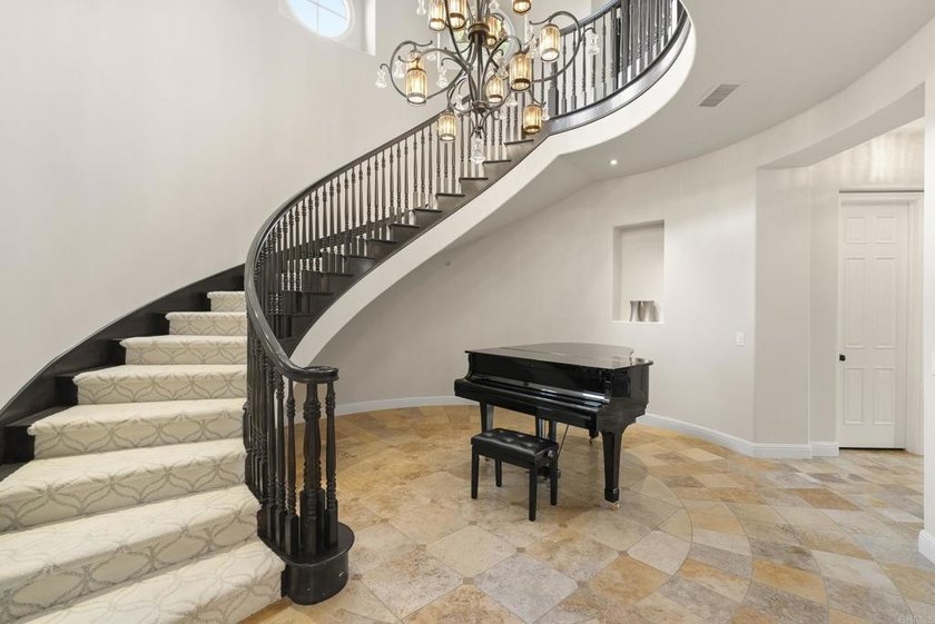 Welcome to 6152 Avenida del Duque, an extraordinary 7-bedroom, 7 - photo 8