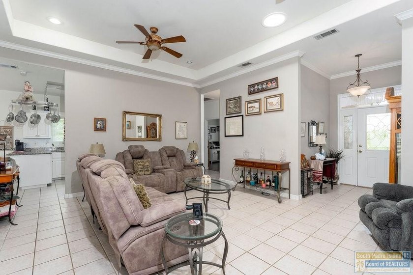 Enjoy peaceful golf course living in this well-maintained - photo 3