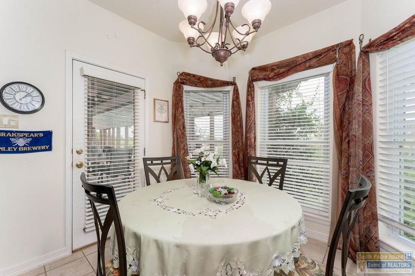 Enjoy peaceful golf course living in this well-maintained - photo 6