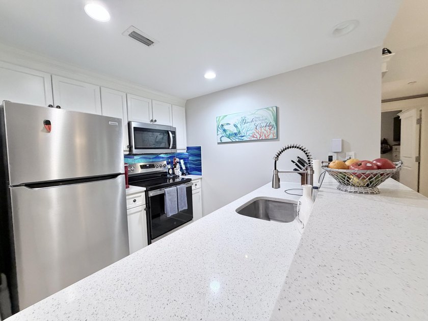 $5,000 Financial Credit to Buyer and condo Assessment Paid in - photo 7
