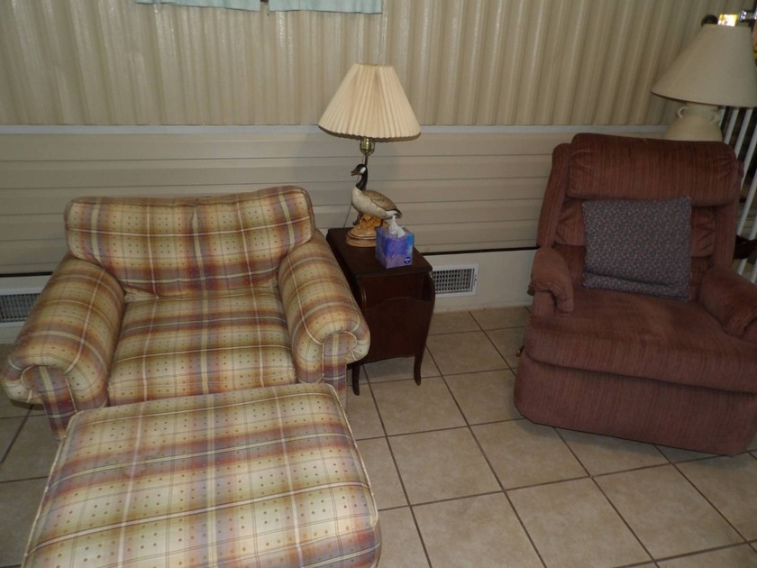 This cozy and partially furnished, 12 X 33 1 BR 1 BA home with - photo 14