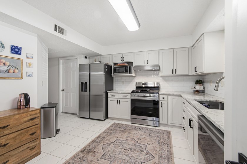 Welcome to 3793 Peachtree Way--a beautifully updated home that - photo 5
