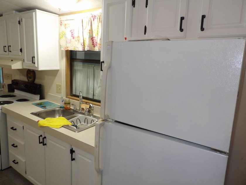 This cozy and partially furnished, 12 X 33 1 BR 1 BA home with - photo 22