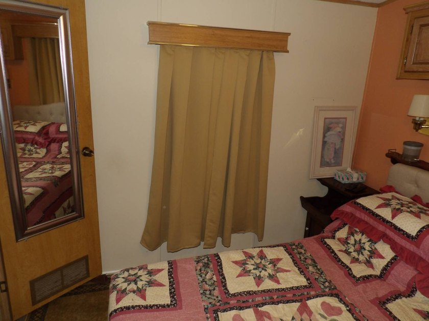 This cozy and partially furnished, 12 X 33 1 BR 1 BA home with - photo 28