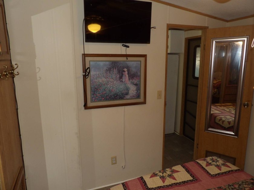 This cozy and partially furnished, 12 X 33 1 BR 1 BA home with - photo 29